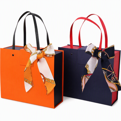 Custom Luxury Tote Style Magnetic Gift Box | Ribbon Handle & Silk Scarf Bow in Orange Navy for Jewelry Fashion & Holiday Luxury Gifts | MOQ 100 pcs