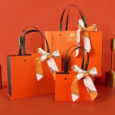 Custom Luxury Tote Style Magnetic Gift Box | Ribbon Handle & Silk Scarf Bow in Orange Navy for Jewelry Fashion & Holiday Luxury Gifts | MOQ 100 pcs