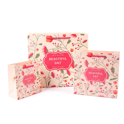 Eco Wholesale New Product New Year Paper Gift Bag Recyclable Custom Logo For Spring Festival Holiday Candy Snack Gift Pack