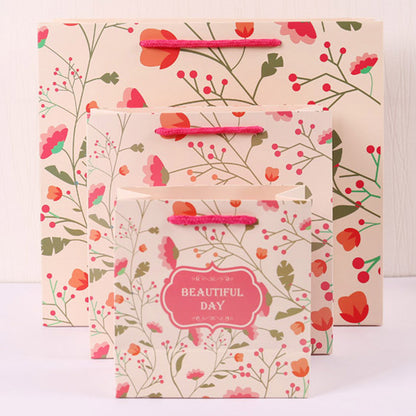 Eco Wholesale New Product New Year Paper Gift Bag Recyclable Custom Logo For Spring Festival Holiday Candy Snack Gift Pack
