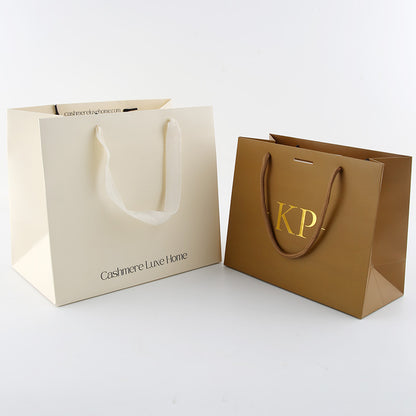 Wholesale Luxury Clothes Shopping Paper Bag Eco Recyclable Custom Logo Ribbon Handle For Apparel Shoes Boutique Gift Pack