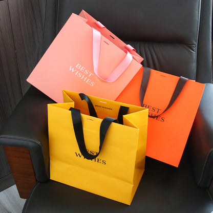 Wholesale Luxury Clothes Shopping Paper Bag Eco Recyclable Custom Logo Ribbon Handle For Apparel Shoes Boutique Gift Pack