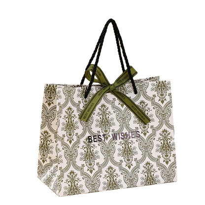 Wholesale Eco-Friendly Portable Paper Gift Bag Recyclable Custom Logo For Birthday Wedding Cosmetic Retail Pack
