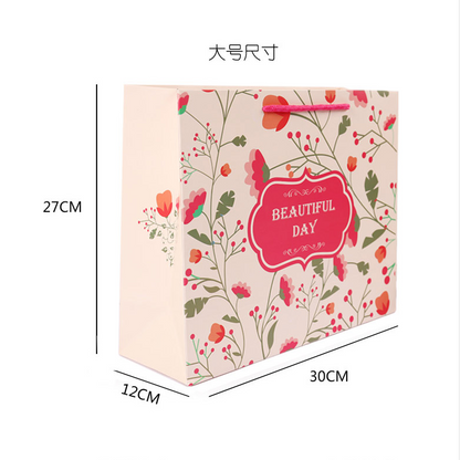 Eco Wholesale New Product New Year Paper Gift Bag Recyclable Custom Logo For Spring Festival Holiday Candy Snack Gift Pack